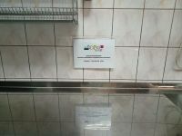 fragment wymienionej zabudowy kuchennej z informacją o dofinansowaniu projektu