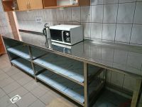 fragment wymienionej zabudowy kuchennej z informacją o dofinansowaniu projektu